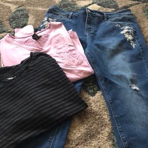 2 shirts and a pair of jeans